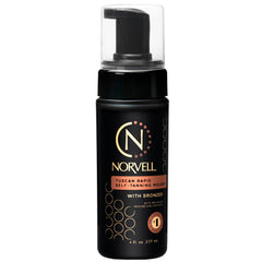 Norvell Tuscan Rapid Self-Tanning Mousse bottle ready for at-home, streak-free tanning.