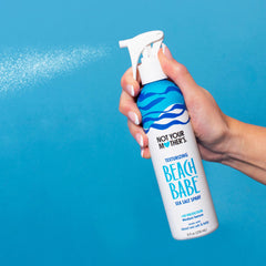 Not Your Mother's Beach Babe Sea Salt Spray on damp hair styling texture.