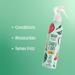 Not Your Mother's Kids Daily Care detangler spray application on hair for easy comb-through.