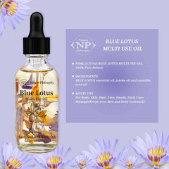 Blue lotus oil dropper dispensing a precise amount for easy daily routine.