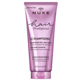 Nuxe Hair Prodigieux High Shine Shampoo bottle for daily shine and nourishment.