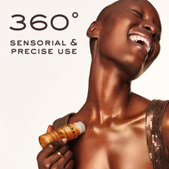 Nuxe Huile Prodigieuse Shimmer on the face with a soft golden glow.