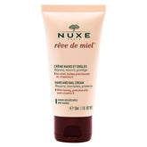 Nuxe Reve de Miel hand cream tube close-up showing silky texture for dry hands.