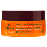 Nuxe Rêve de Miel scrub texture closeup with honey crystals for smoother skin.