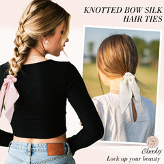 obeoby satin bow scrunchie close-up showing silky texture and gentle hair grip