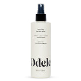 Odele Texturizing Sea Salt Spray bottle front showing voluminous, textured hair possibilities.