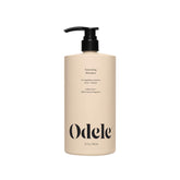 Odele volumizing sulfate-free shampoo bottle front shows weightless moisture for fine or oily hair