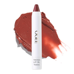 Ogee Nolana lip oil terracotta-swirl showcases buildable color and conditioning shine.