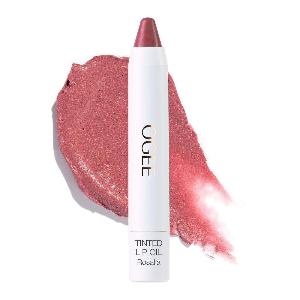 Ogee Rosalia lip oil tint swatch reveals sheer dusty rose color with hydrating shine for everyday lips.