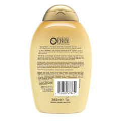 OGX ingredients panel with coffee extract and coconut oil highlights nourishing, breakage-resistant strands.