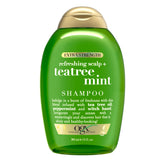 OGX Extra Strength Tea Tree Mint Shampoo bottle for refreshing scalp cleanse