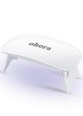 ohora Care LED Lamp compact size for convenient on-the-go gel nail curing.