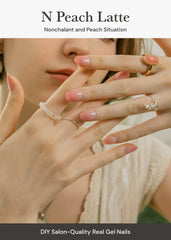 ohora semi-cured gel nail strips n peach latte on nails demonstrating a smooth pink jelly finish.