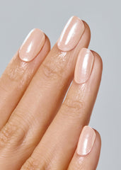 ohora Vanilla Chrome semi-cured gel nails being applied with any lamp for fast cure