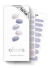 ohora afterglow blue glitter nail strips for salon-grade at-home manicures.