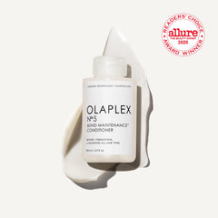 Olaplex N°5 bottle pump enabling easy, precise application for detangling.