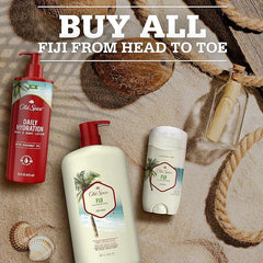 Applying Old Spice Fiji dry spray for quick daily odor protection.