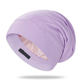 OLESILK silk bonnet front view shows smooth fabric for nighttime hair protection.
