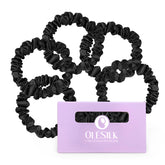 OLESILK silk hair ties five-pack in black; closeup highlights smooth mulberry silk for gentle styling.