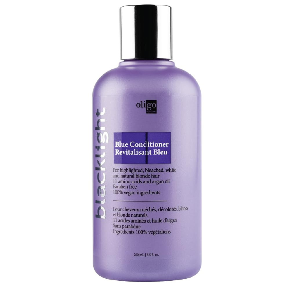 Oligo Professionnel Blacklight Blue Conditioner applied on damp hair for brass-tone refresh
