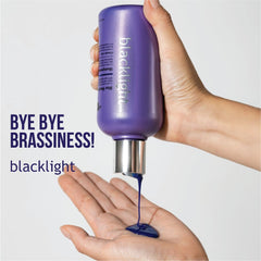 Oligo Professionnel Blacklight Blue conditioner bottle provides hydrating blue toning for blonde hair