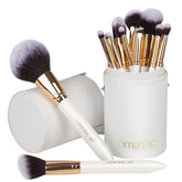 OMANIAC Makeup Brush Set close-up shows pearlescent wood handles for smooth application.