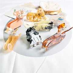 OMG Decor Dachshund hair clip one-size-fits-all design fits all hair types.