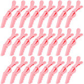 Ondder pink alligator clip for hair sectioning with secure hold during styling.