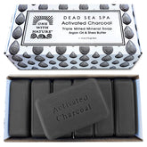 One With Nature charcoal soap bar foreground for detoxifying cleansing and brighter pores.