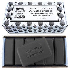 One With Nature charcoal soap bar foreground for detoxifying cleansing and brighter pores.