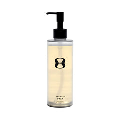 OneSkin PREP cleanser bottle closeup showing a gentle daily gel for sensitive skin