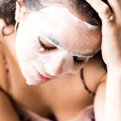 ORGAID Organic Sheet Mask essence close-up highlighting hydrating formula.