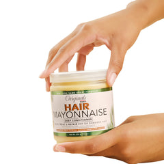 Originals by Africa's Best hair mayonnaise texture swirl demonstrates rich, creamy conditioning for damaged hair repair.