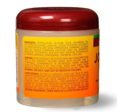 ORS Jojoba Oil Hairdress on hair shaft boosts shine and manageability.