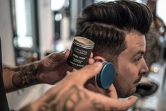 Osmo Firm Hold Clay Wax on hair model displaying defined texture
