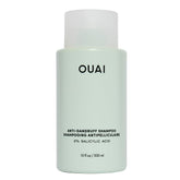 OUAI anti-dandruff shampoo bottle pour showing soothing scalp relief