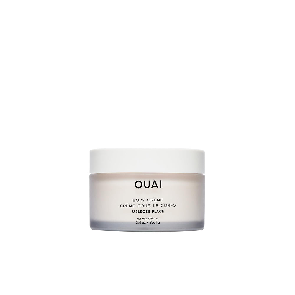 OUAI Melrose Place travel bottle highlights rose scent for on-the-go hydration.