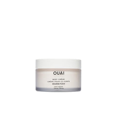 OUAI Melrose Place travel bottle highlights rose scent for on-the-go hydration.