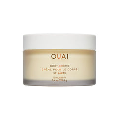 OUAI Body Crème St. Barts travel-size bottle offers portable hydration on the go.