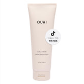 OUAI Curl Cream on wet hair showing defined, bouncy waves