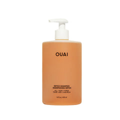 OUAI Detox Shampoo bottle closeup shows clarifying power for residue-free scalp.