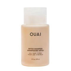 OUAI Detox Shampoo travel-size bottle shows clarifying formula for quick refresh and buildup removal