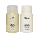 OUAI Fine Shampoo bottle closeup highlighting volumizing formula for fine hair.