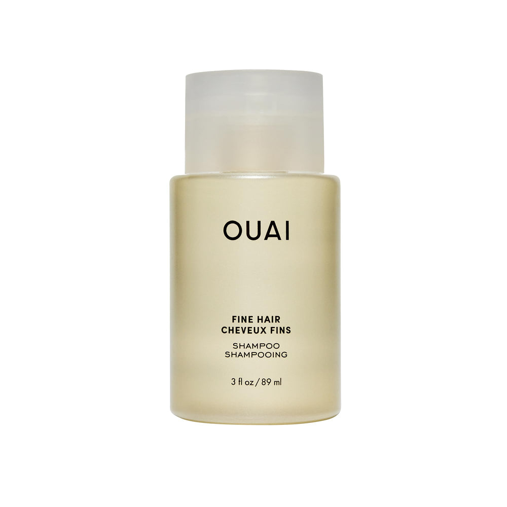 OUAI Fine Shampoo travel-size bottle shows color-safe volumizing cleanse.