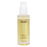 OUAI Hair Oil bottle with glossy finish for sleek, frizz-free shine.