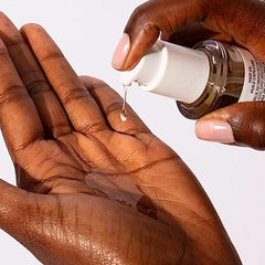 OUAI Hair Oil heat protection graphic highlights heat styling defense.