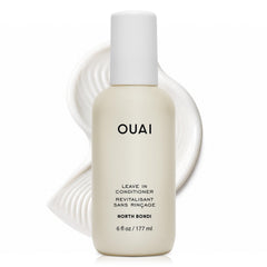 OUAI bottle front packaging showing product and benefit of detangling