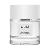 OUAI North Bondi eau de parfum bottle shines on a vanity with a fresh floral mood