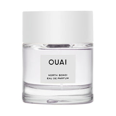 OUAI North Bondi eau de parfum bottle shines on a vanity with a fresh floral mood