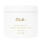 OUAI Scalp & Body Scrub bottle shows rich lather for gentle exfoliation on scalp and body.